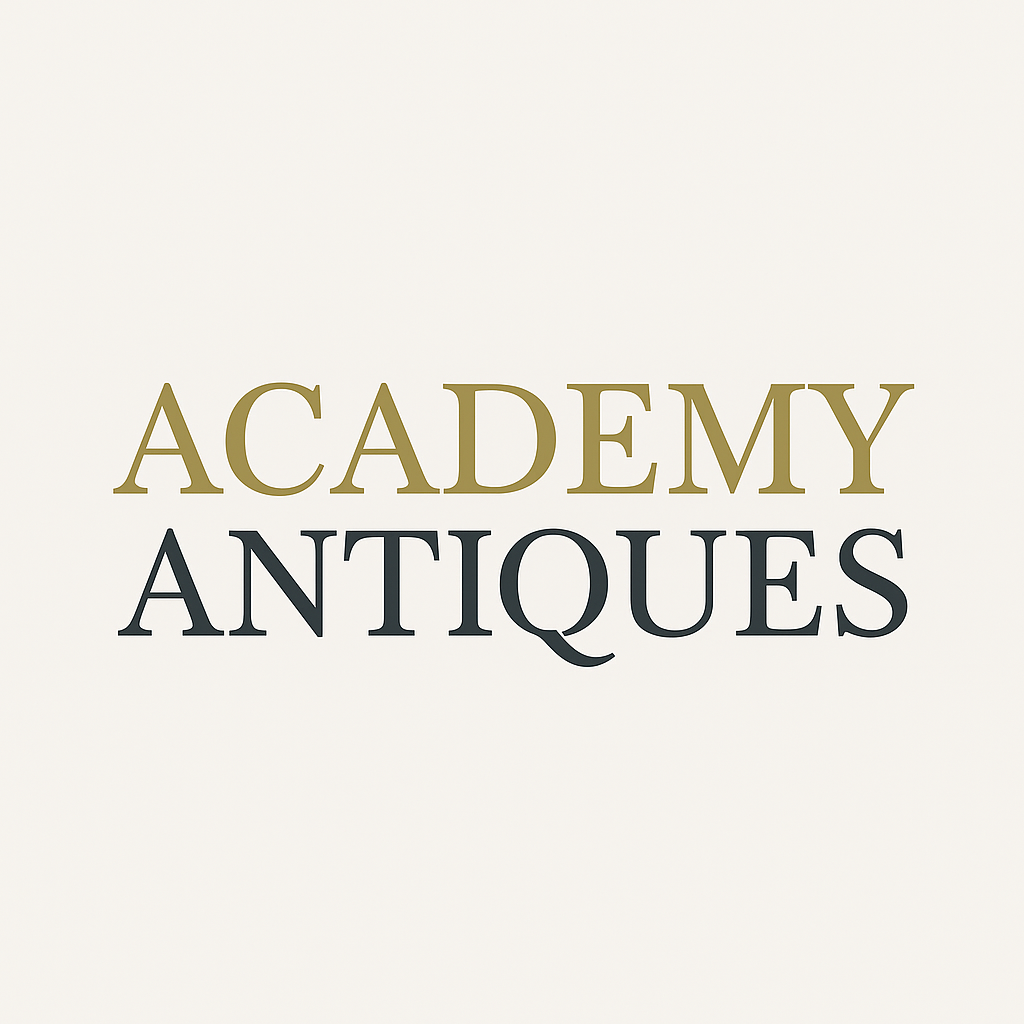 a logo with academy antiques on it in gold and grey