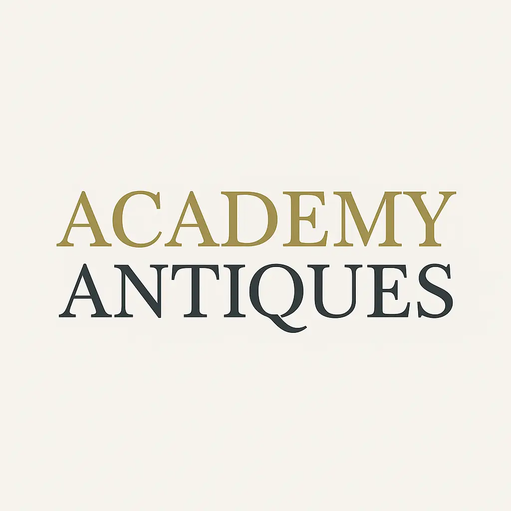a logo with academy antiques on it in gold and grey